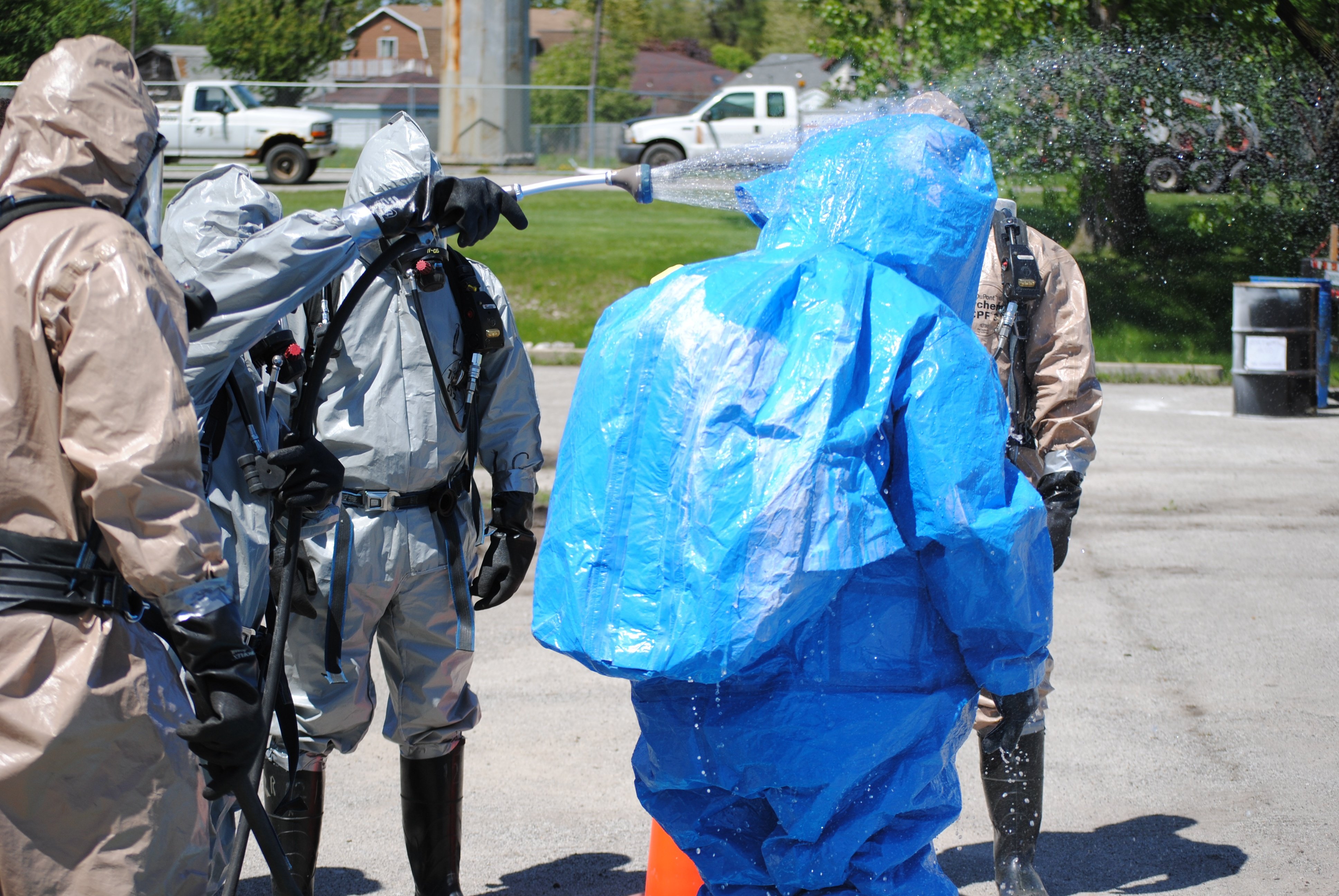 Hazwoper students learn how to properly perform decontamination during training exercises